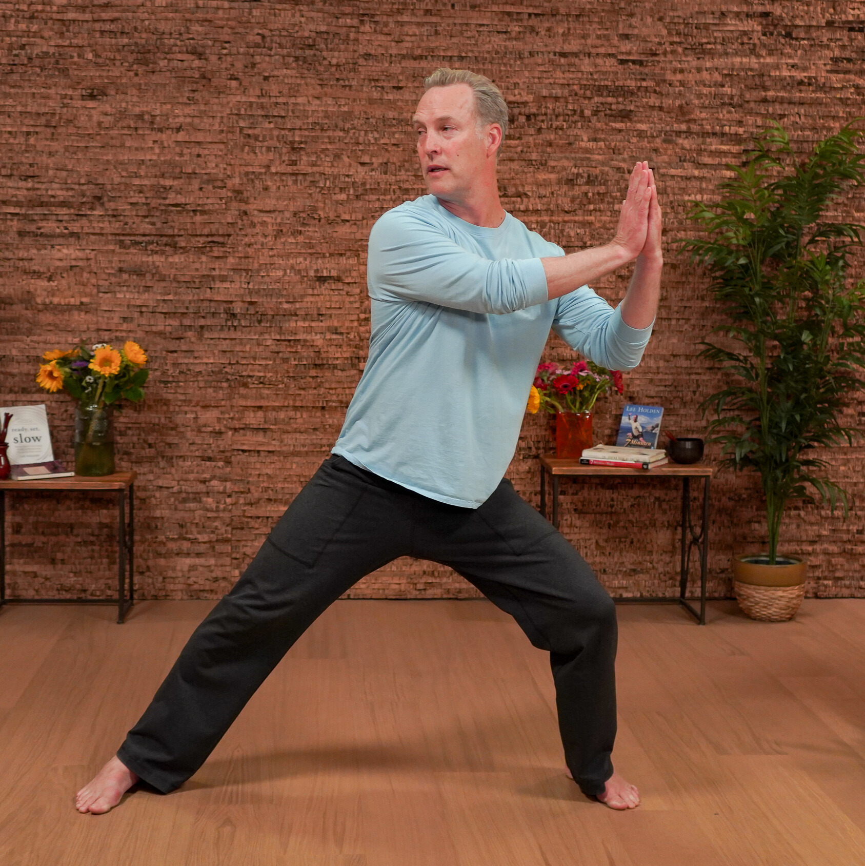 Man demonstrating Qigong movements