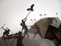 Paper art of working men's silhouettes