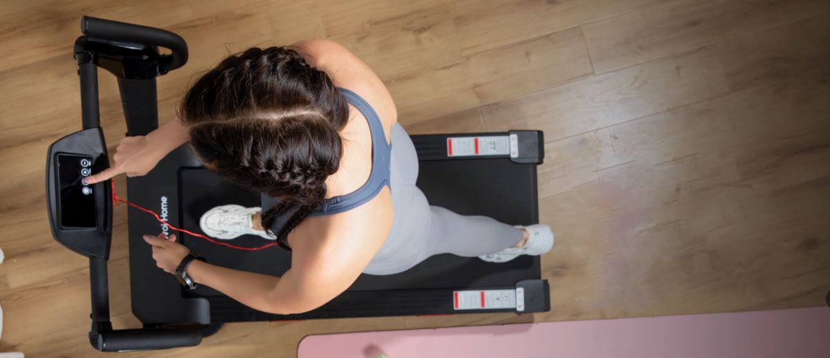 Woman on Mobvoi Home Treadmill Incline