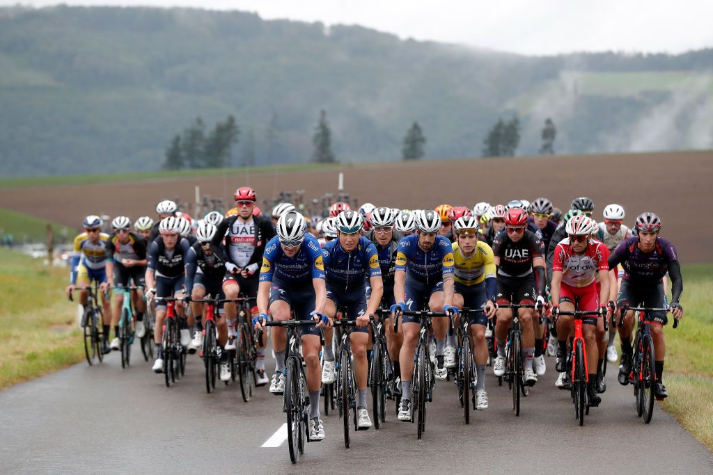 ESCHSURSRE LUXEMBOURG SEPTEMBER 15 LR Pieter Serry of Belgium Mauri Vansevenant of Belgium Fausto Masnada of Italy Mattia Cattaneo of Italy and Joo Almeida of Portugal and Team Deceuninck QuickStep yellow leader jersey lead The Peloton during the 81st SkodaTour De Luxembourg 2021 Stage 2 a 1861km stage from Steinfort to EschSurSre Eschdorf 504m skodatour skodatour on September 15 2021 in EschSurSre Luxembourg Photo by Bas CzerwinskiGetty Images