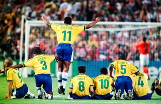 Brazil players react after the Netherlands miss a second penalty in the shootout in the teams' World Cup semi-final in 1998.