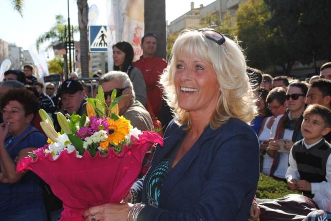 This woman got Valverde's podium bouquet.