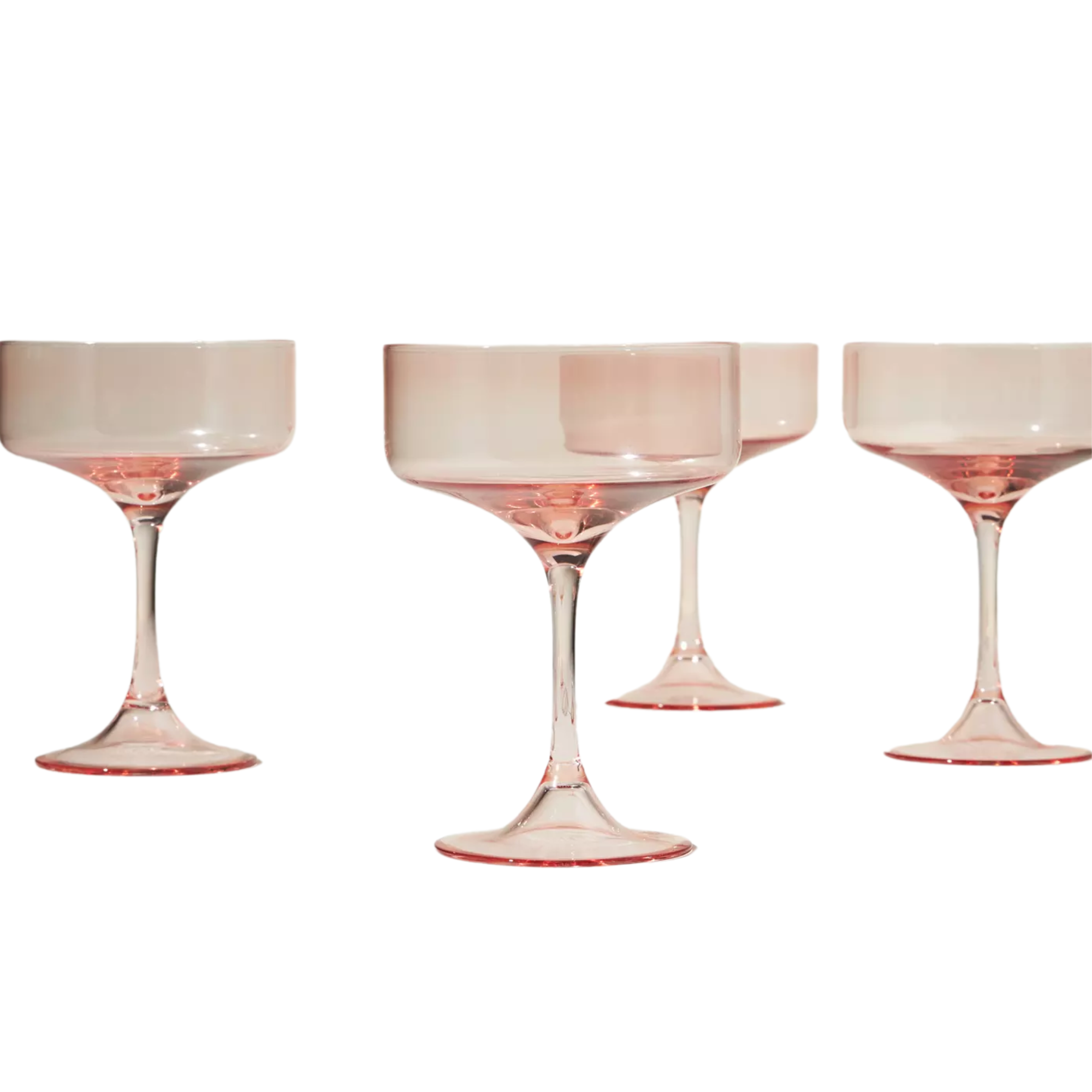 four coupe cocktail glasses in a translucent pink color