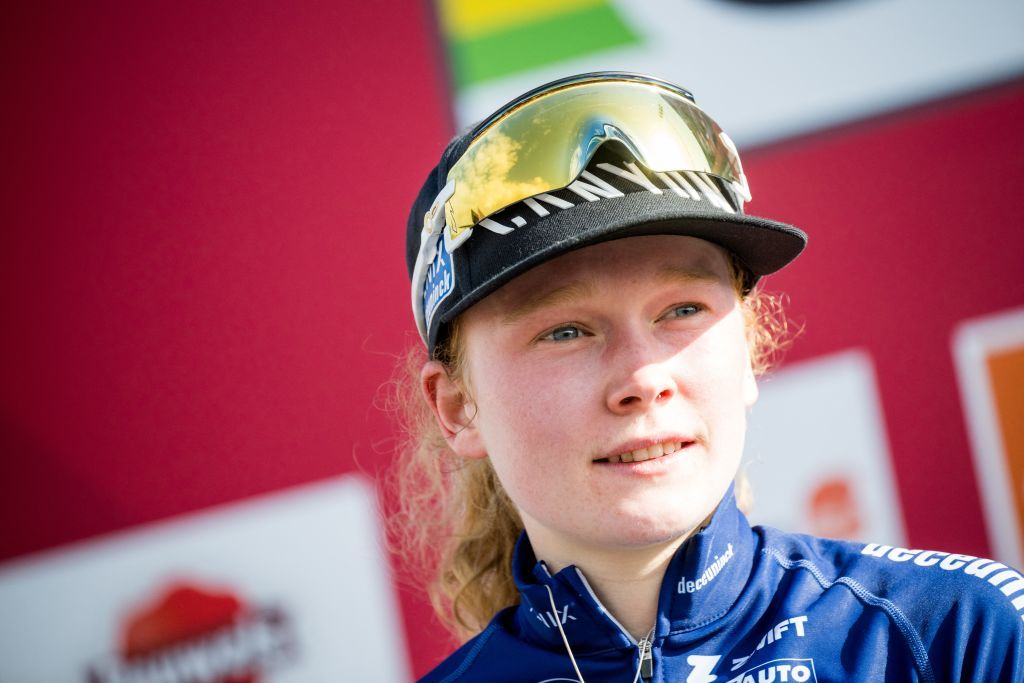 Dutch Puck Pieterse pictured on the podium after the women's elite race at the cyclocross cycling event in Benidorm, Spain, Sunday 21 January 2024, stage 13/14 in the World Cup ranking. BELGA PHOTO JASPER JACOBS (Photo by JASPER JACOBS / BELGA MAG / Belga via AFP)