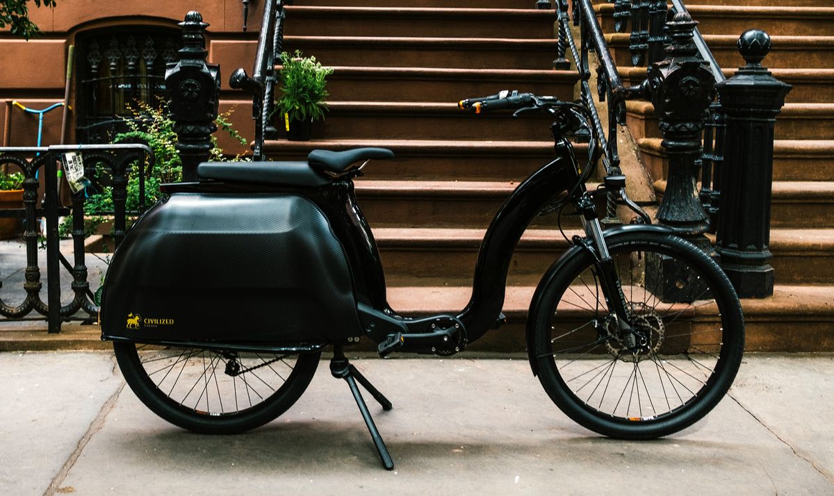 The Civilized Cycles Model 1 electric bike on a New York City sidewalk.