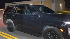 Tiger Woods in a car after being released from jail