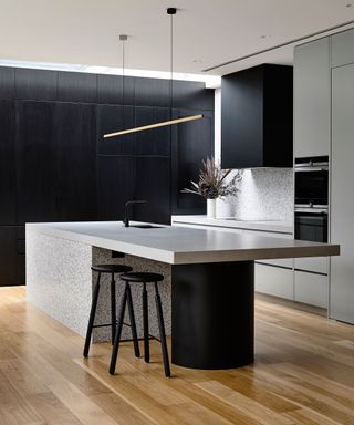 Black kitchen with handleless cabientry