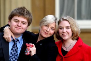 Victoria Wood with children Henry and Grace Durham after receiving her CBE
