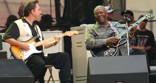 Jimmy Vaughan plays a Strat as he jams with his hero, B.B. King, who is playing his customary Lucille.