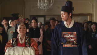 Kelly Marie Tran and Han Gi-Chan in traditional Korean wedding attire in The Wedding Banquet