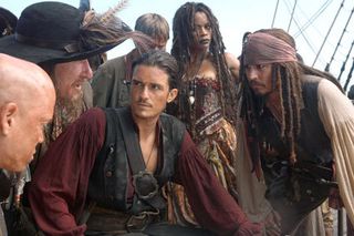 Pirates conversing. There is a lot of this in the film.