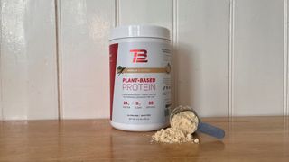 TB12 Plant Based Protein tub and scoop