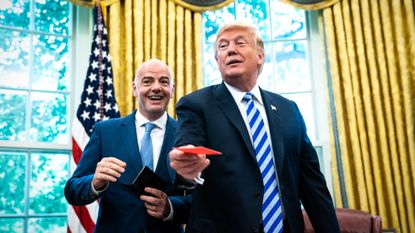 FIFA head Gianni Infantino hands red card to President Donald Trump in the Oval Office
