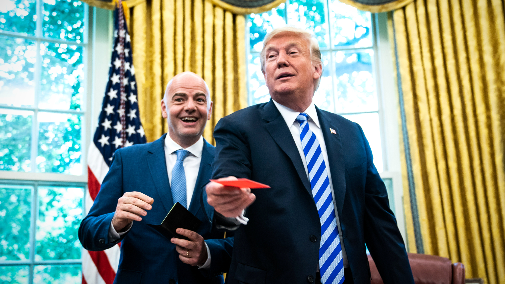 FIFA head Gianni Infantino hands red card to President Donald Trump in the Oval Office