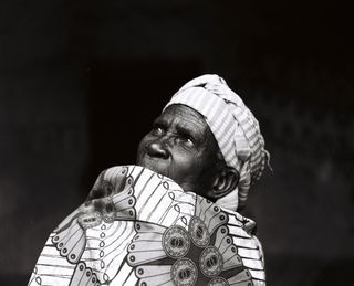Portrait of Theresia Ukwitegetse, 80 in Rwanda by Elena Heatherwick commissioned by WaterAid