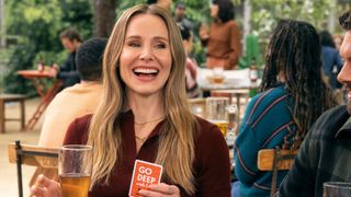Joanne (Kristen Bell) smiling in a scene from "Nobody Wants This" season 2