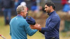 Aaron Rai shaking hands with Ryder Cup captain Luke Donald after playing alongside him at the Scottish Open