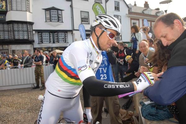 Thor Hushovd signs autographs for fans