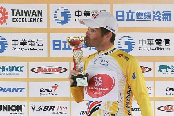 Rhys Pollock (Drapac Cycling) kisses the trophy of the final winner