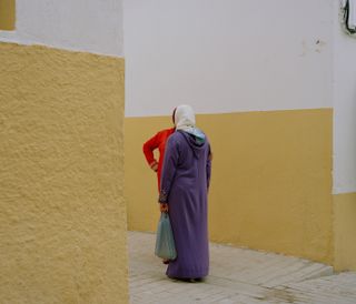 two women meeting in the street