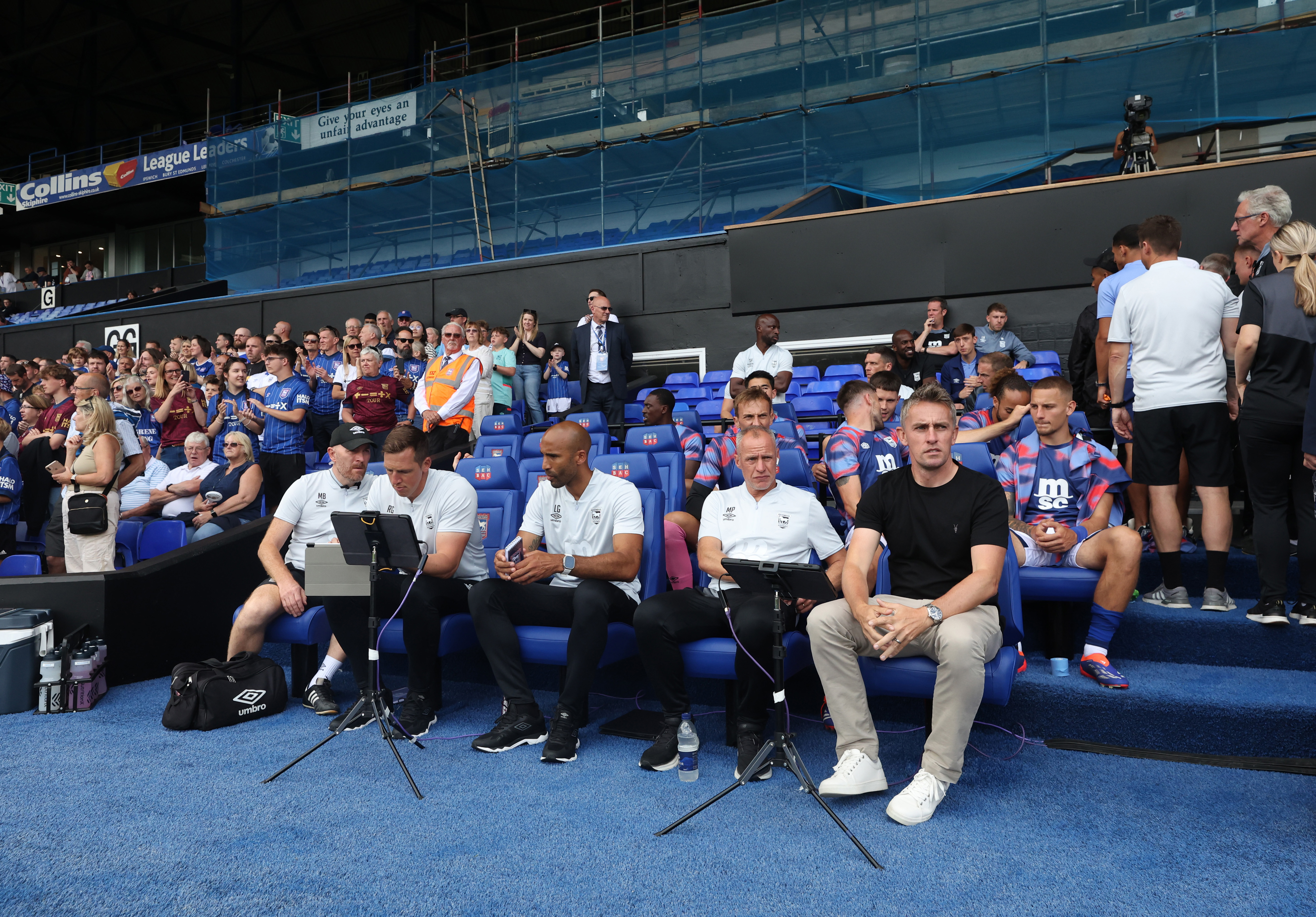 Kieran McKenna in the dugout with his Ipswich coaching staff