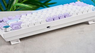 A white and purple Epomaker Ajazz AK820 Pro mechanical keyboard