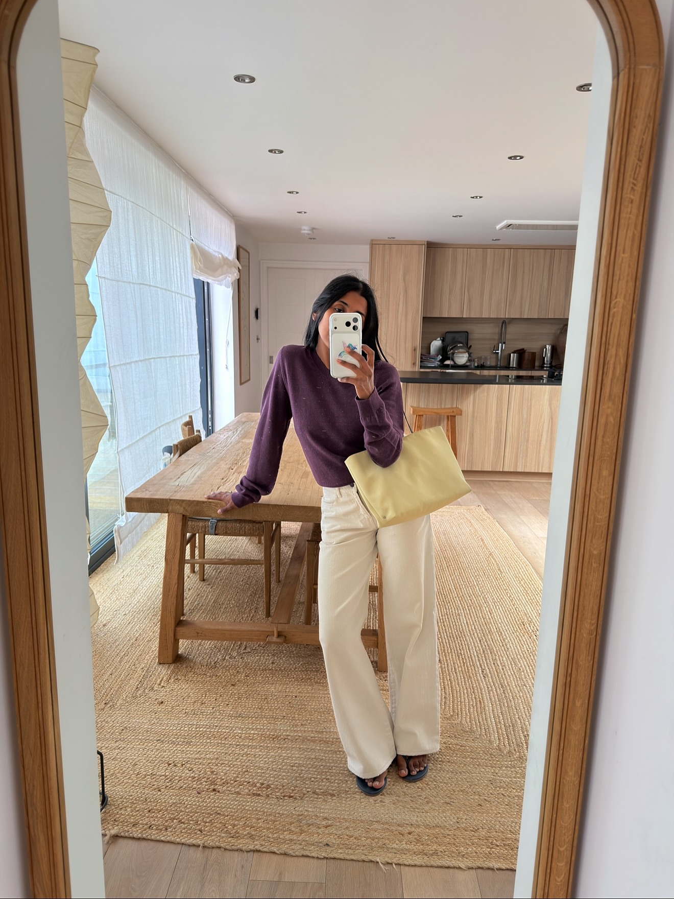 Aubergine top and white jeans.