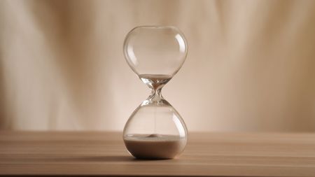 Not a lot of sand left in the top of an hourglass.