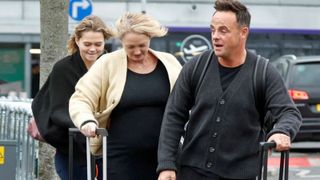 Anne Marie Corbett and Ant McPartlin at the airport with luggage