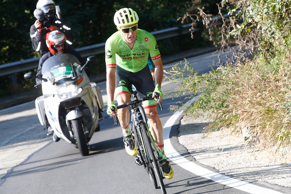 Mike Woods rides solo near the end of Milano-Torino