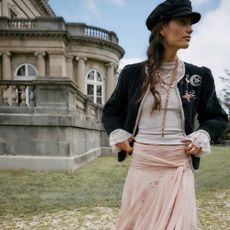 Model in a Manor garden wearing Free People clothing