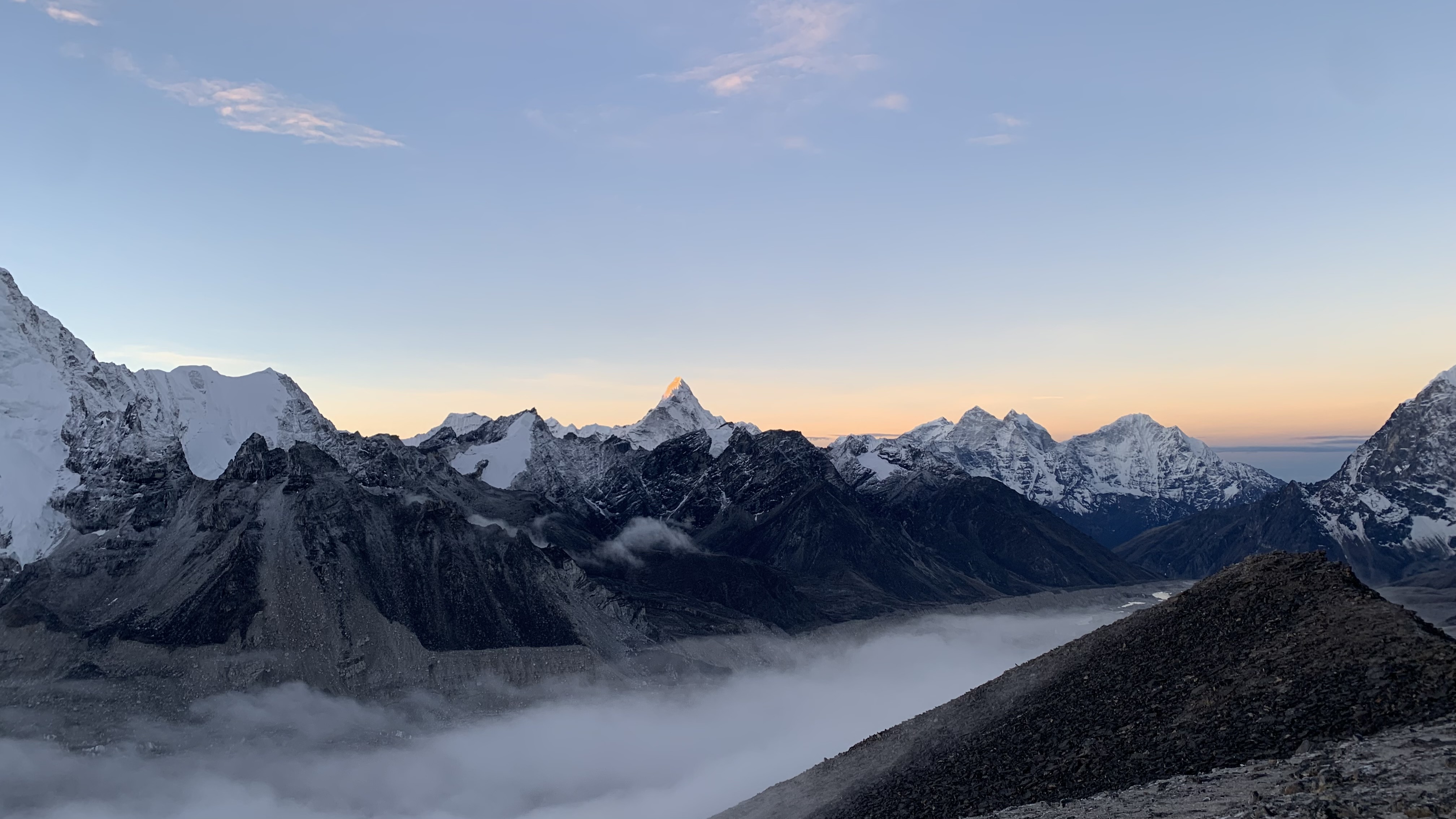 The sun rises over Ama Dablam