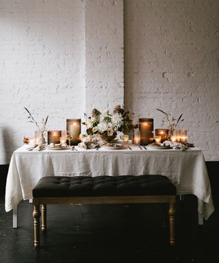 A modern french country inspired Thanksgiving tabletop with fluted glass votive