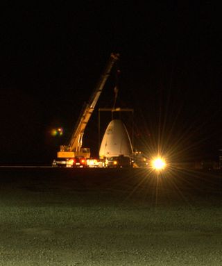 Blue Origin's Goddard vehicle is lowered on the launch pad for a Nov. 13, 2006 test flight.