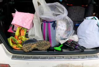save money on petrol - cluttered car boot