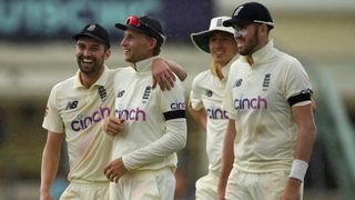 Joe Root and England cricket players celebrating