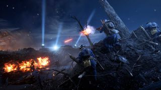 Soldiers rush over a hill as searchlights shine in the distance, and battle erupts