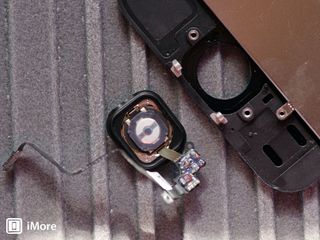 A few screws, a shield, and some careful prying - we've removed the Touch ID sensor and the actual Home button