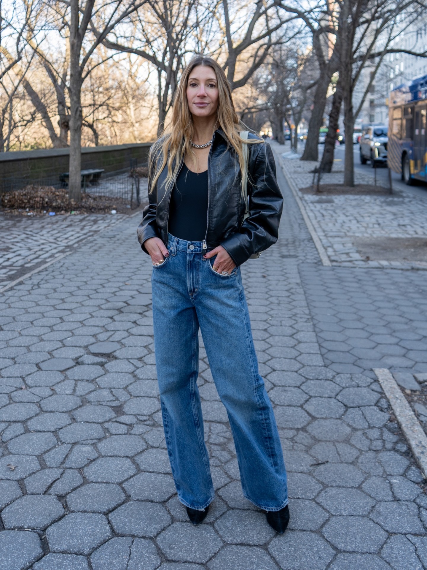 Lindsey Weiss of Cocoincashmere poses in Agolde Low Curve Jean in the Chapter wash from her 2026 denim collaboration.
