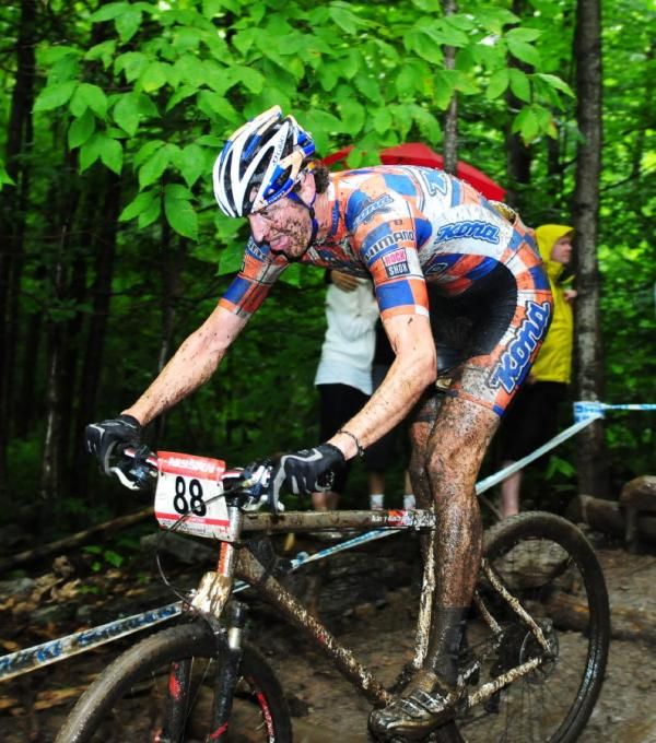 Barry Wicks (Kona) riding to 49th place.