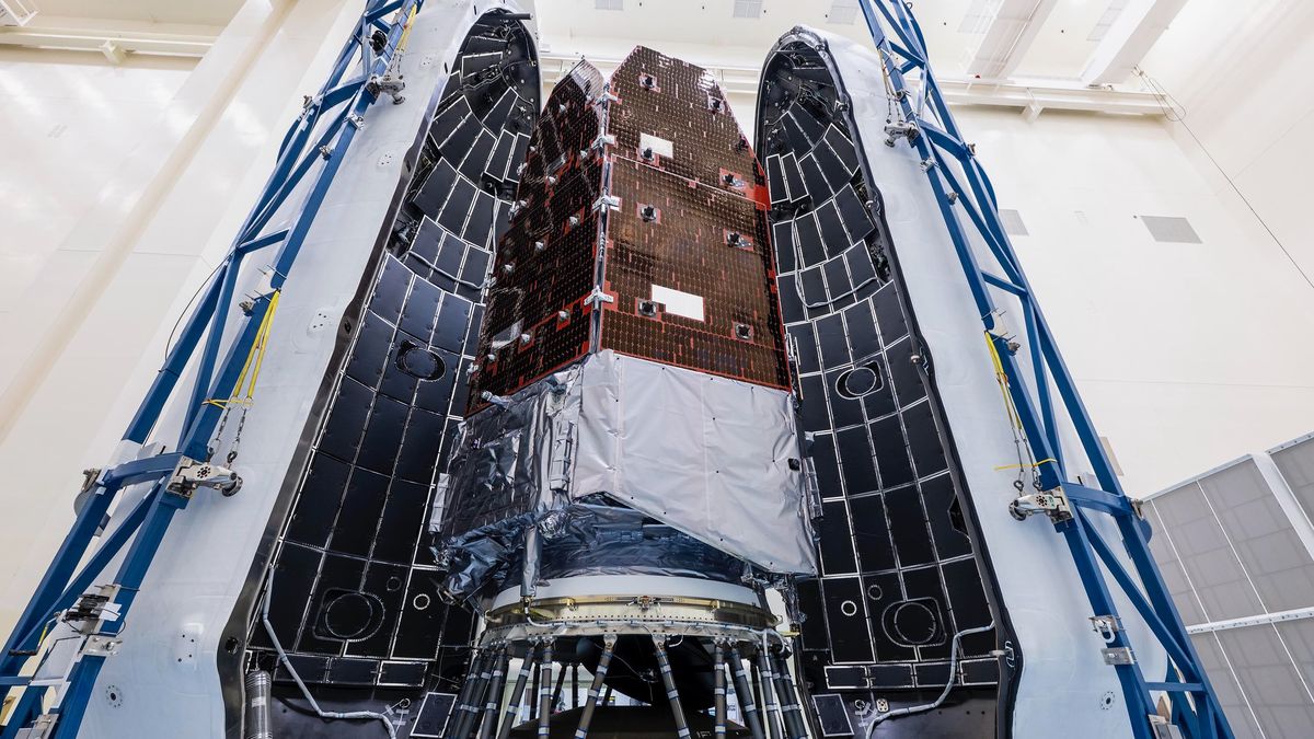 NASA's Nancy Grace Roman Space Telescope is encapsulated in the payload fairing of its SpaceX Falcon Heavy rocket.
