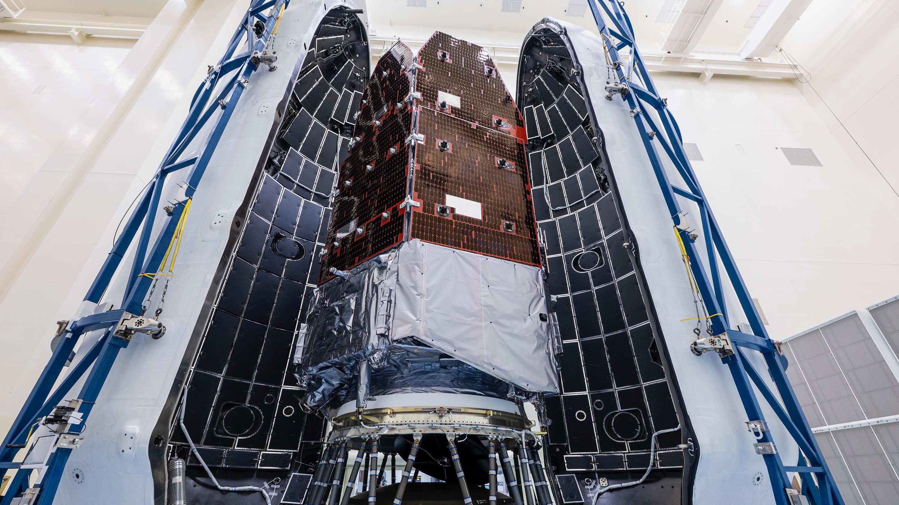 NASA's Nancy Grace Roman Space Telescope is encapsulated in the payload fairing of its SpaceX Falcon Heavy rocket.