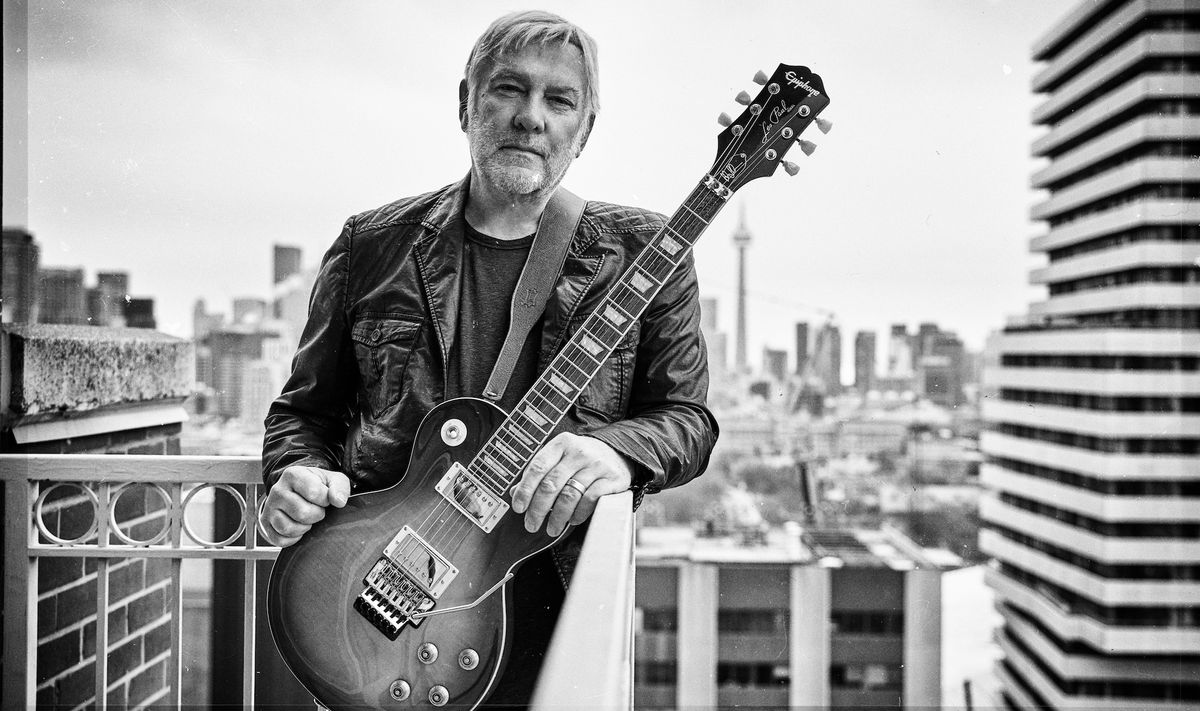 Alex Lifeson with his new Epiphone Les Paul Axcess Standard