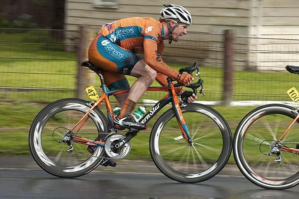 Joel Pearson (Genesys Wealth Advisers) follows close behind a wheel in-front during the peloton's chase to bring back the leading trio.