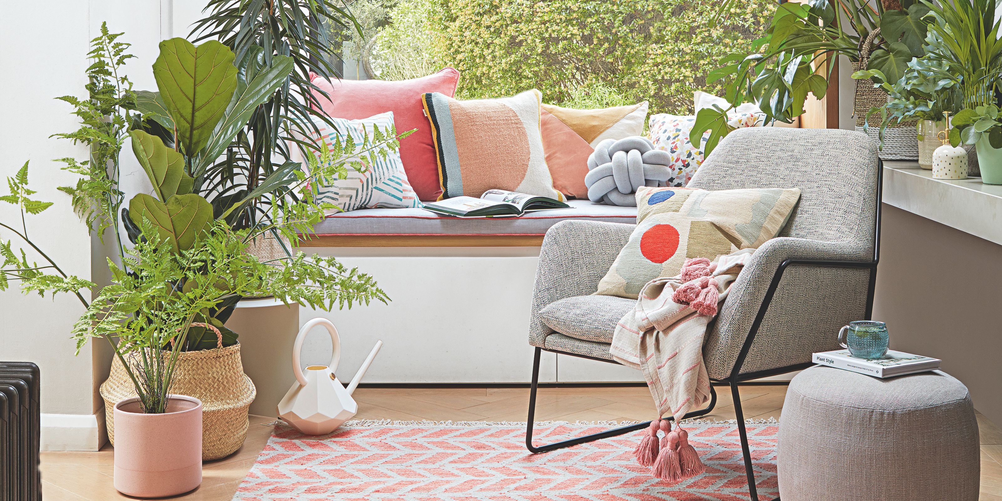 A colourful window seat with peach and red accents