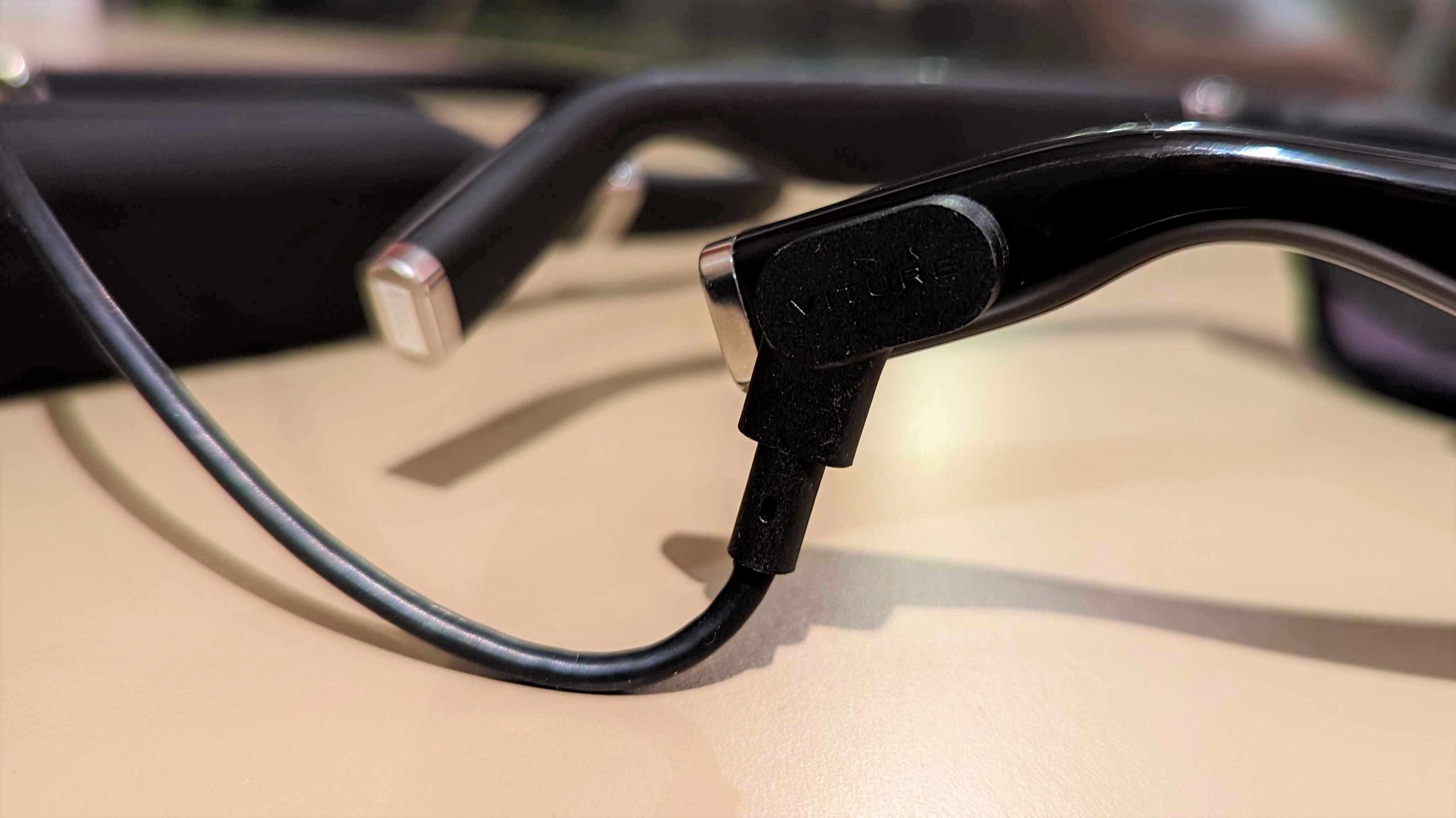 The VITURE One XR Glasses power cable inserted into the port