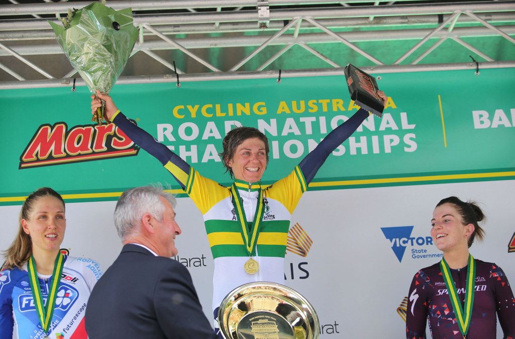 Katrin Garfoot on top step of the podium ahead of Shara Gillow and Kate Perry