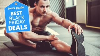 Man performing hamstring stretch wearing cross training shoes with Black Friday deals badge top left