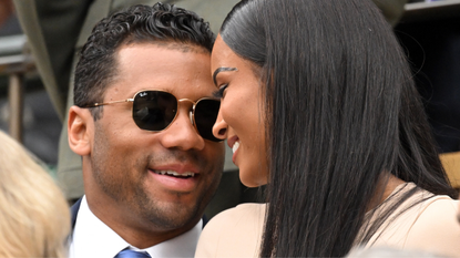 Russell Wilson and Ciara smile at each other