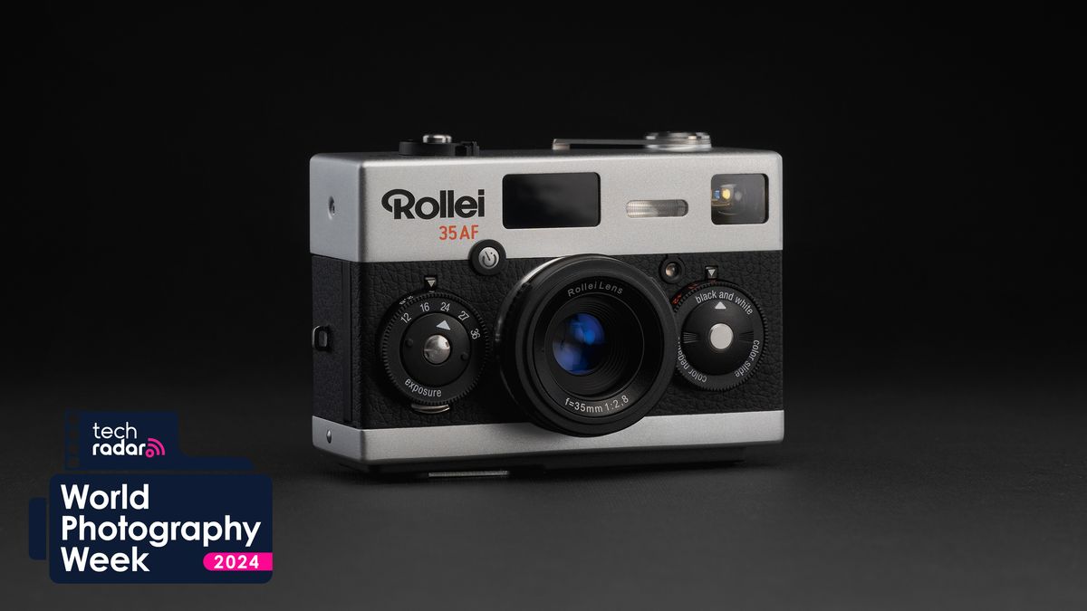 Rollei 35AF film camera on a gray surface and black background